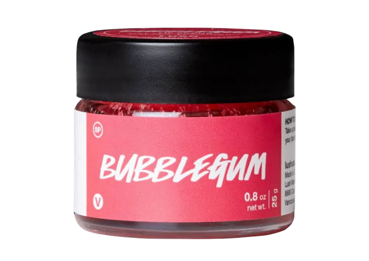 Lush Bubblegum Lip Scrub dalam jar kaca dengan scrub berwarna pink cerah